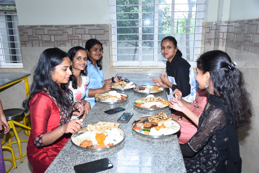 Students sharing a meal in the campus dining area